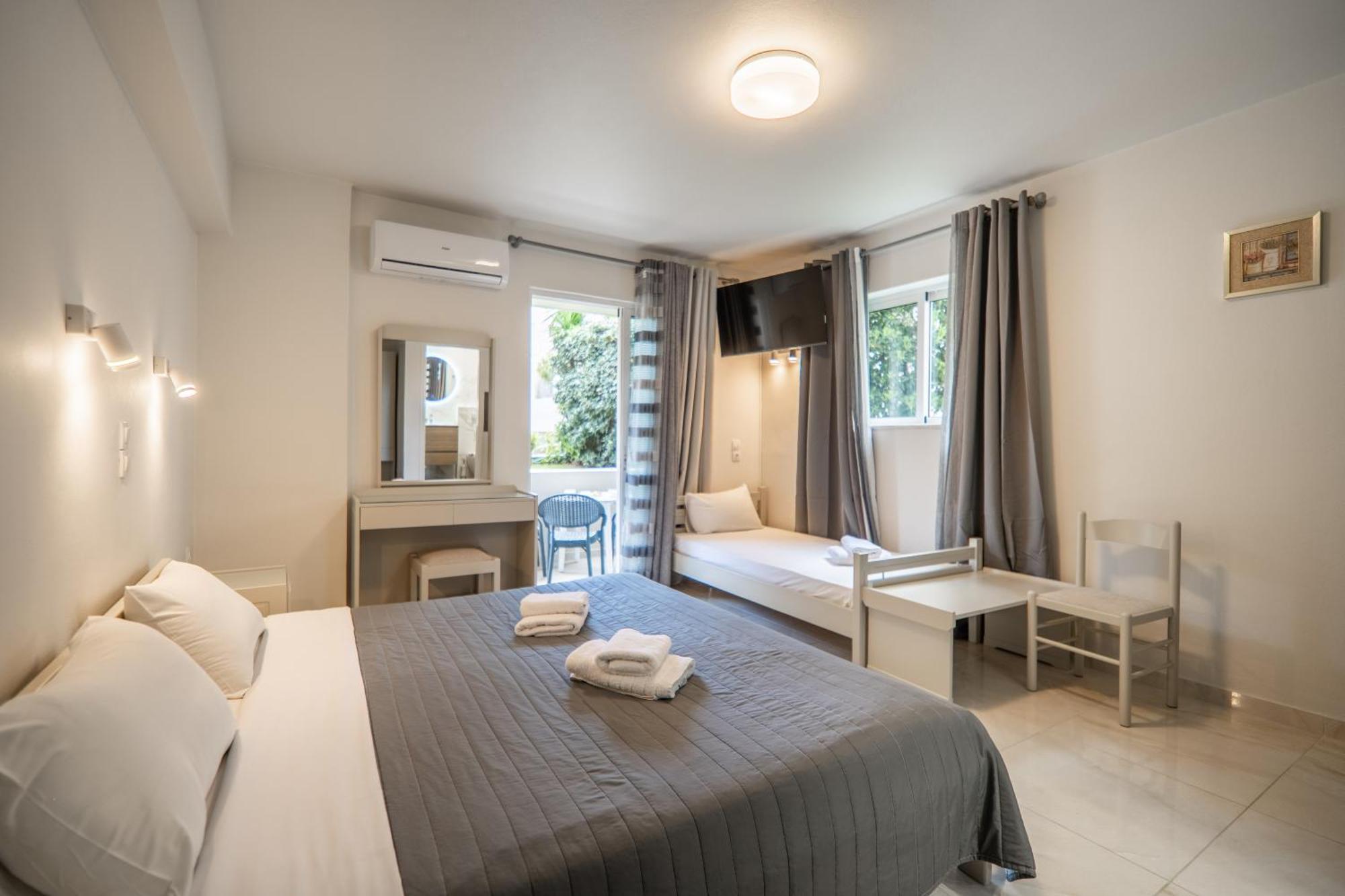 Manos Beachside Apartments Агия-Марина Экстерьер фото